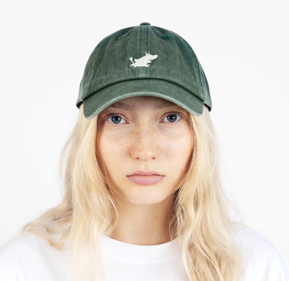 Model wearing a Moomin cap from a European Hertwill brand