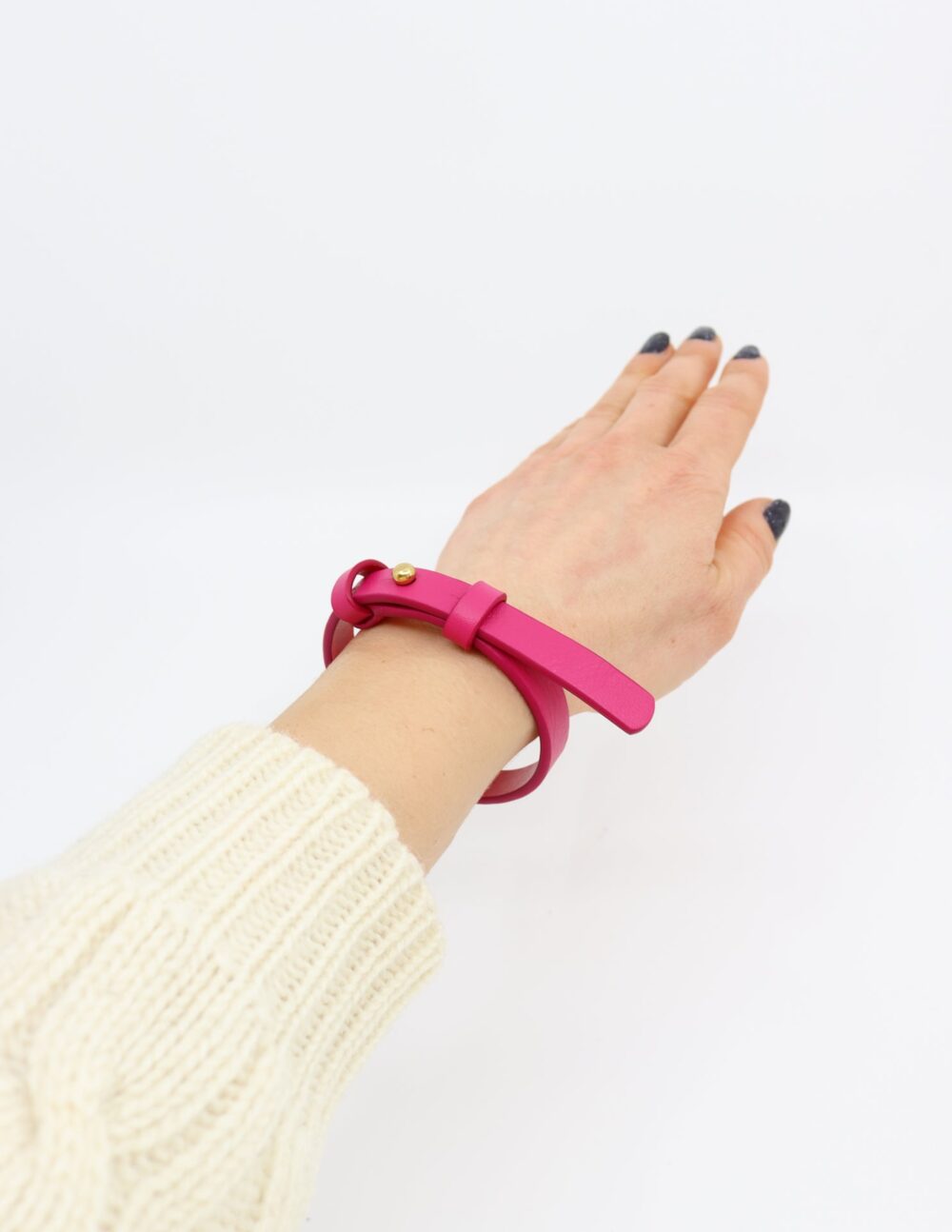 Leather Bracelet With a Brass Fastener in Fuchsia - Image 2